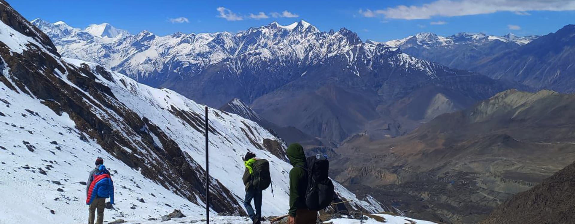 Trekkers heading down from the high peaks of the Annapurna Circuit.